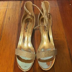 Formal, block heels with gold sparkles.